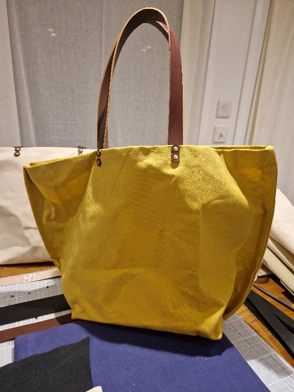 Affordable Bags For Budget Shoppers TOTELY CANVAS BUCKET in Yellow