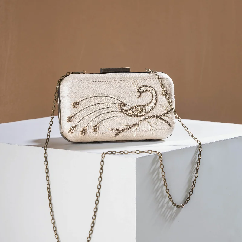 Chic Bags For Office Professionals And Urban Dwellers White - Zardozi Hand Embroidered Tussar Silk Clutch/Sling Bag Chic Bags For Office Professionals And Urban Dwellers White - Zardozi Hand Embroidered Tussar Silk Clutch/Sling Bag