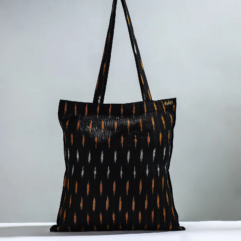 Edgy Bags For Bold And Daring Fashionistas Black - Handcrafted Pochampally Ikat Weave Cotton Jhola Bag Edgy Bags For Bold And Daring Fashionistas Black - Handcrafted Pochampally Ikat Weave Cotton Jhola Bag